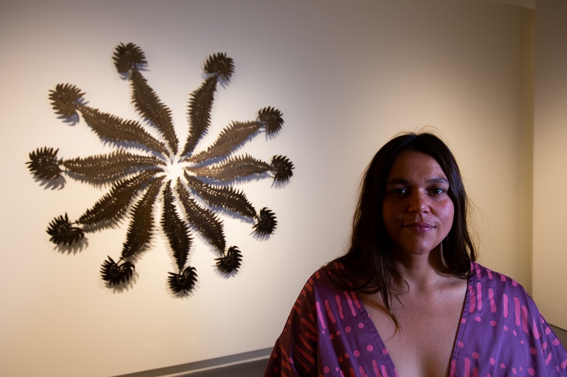 Yapang Art Prize winner Maddison Gibbs with her work at MAC resized.jpg